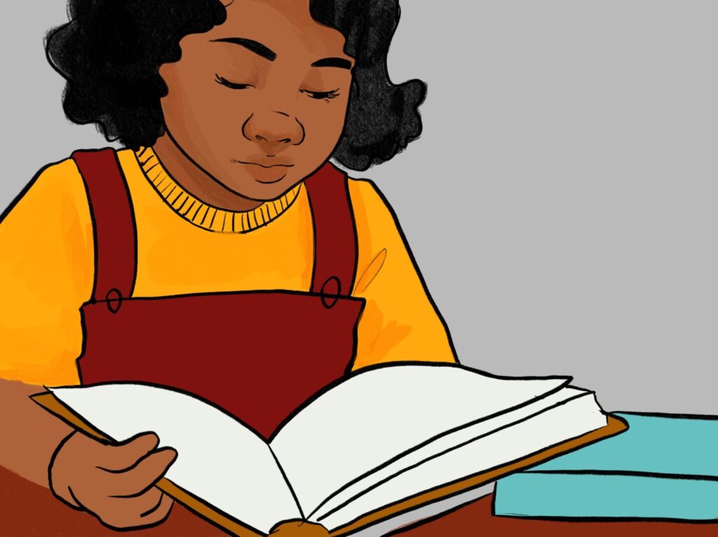 An Aboriginal child reading books, she is wearing a bright yellow shirt and red overalls.